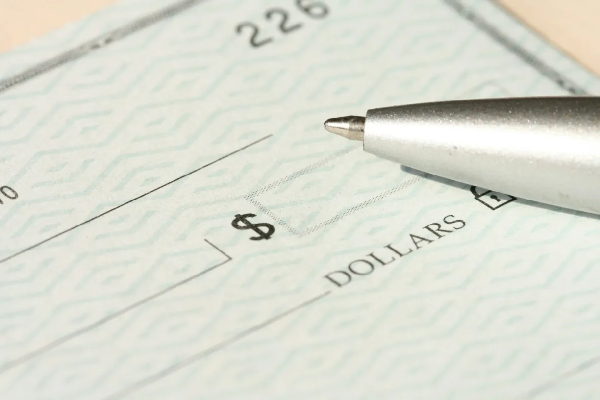 Blank paycheck ready to be issued, highlighting the process of recovering unpaid wages and fair compensation.