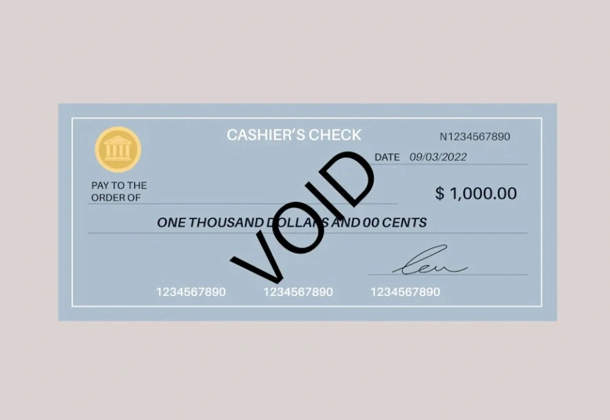 Voided paycheck or cashier’s check symbolizing missing wages or denied compensation owed to workers.