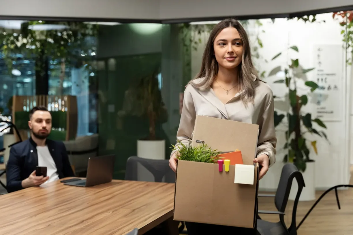 Employee leaving workplace after termination explaining how to file for wrongful termination