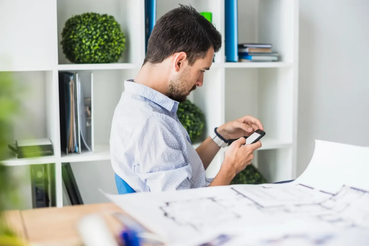 Employee reviewing work messages and documents related to wages and job duties