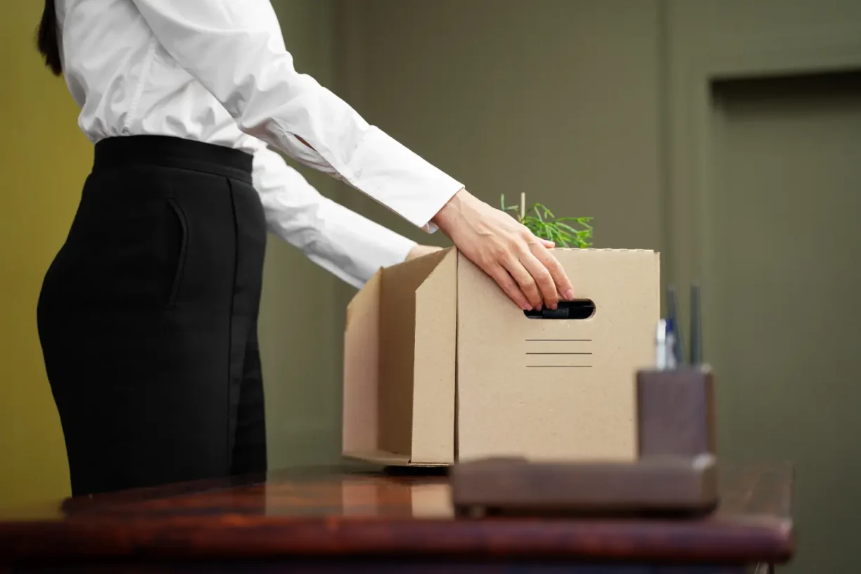 Fired employee packing office belongings and learning how to file for wrongful termination