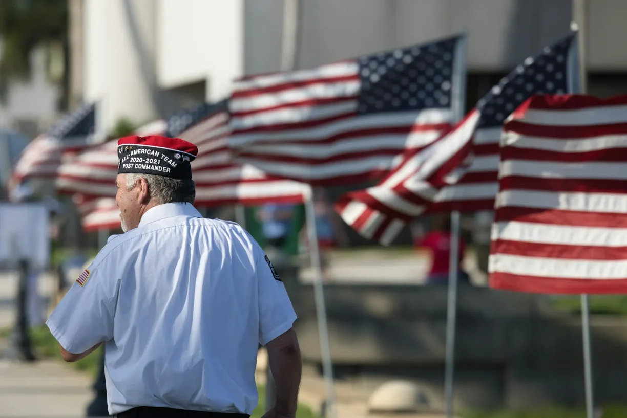U.S. veteran honoring service and discussing veterans day paid holiday laws